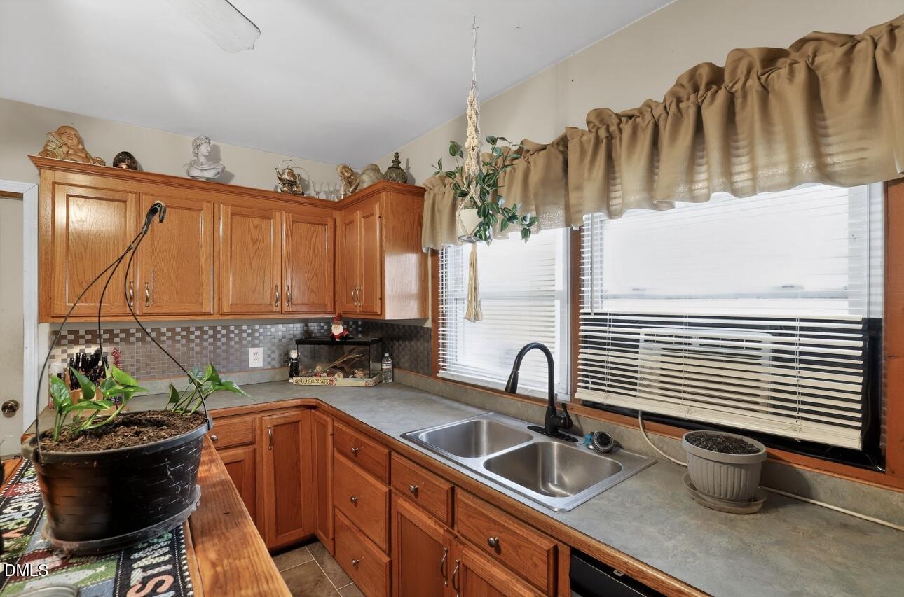 860 Virginia Road Marion, NC 28752 - Photo 10 of 23 a kitchen with a sink and a window