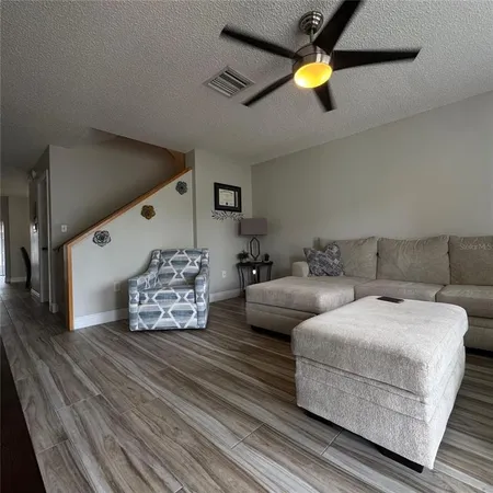 a bedroom with bed and window