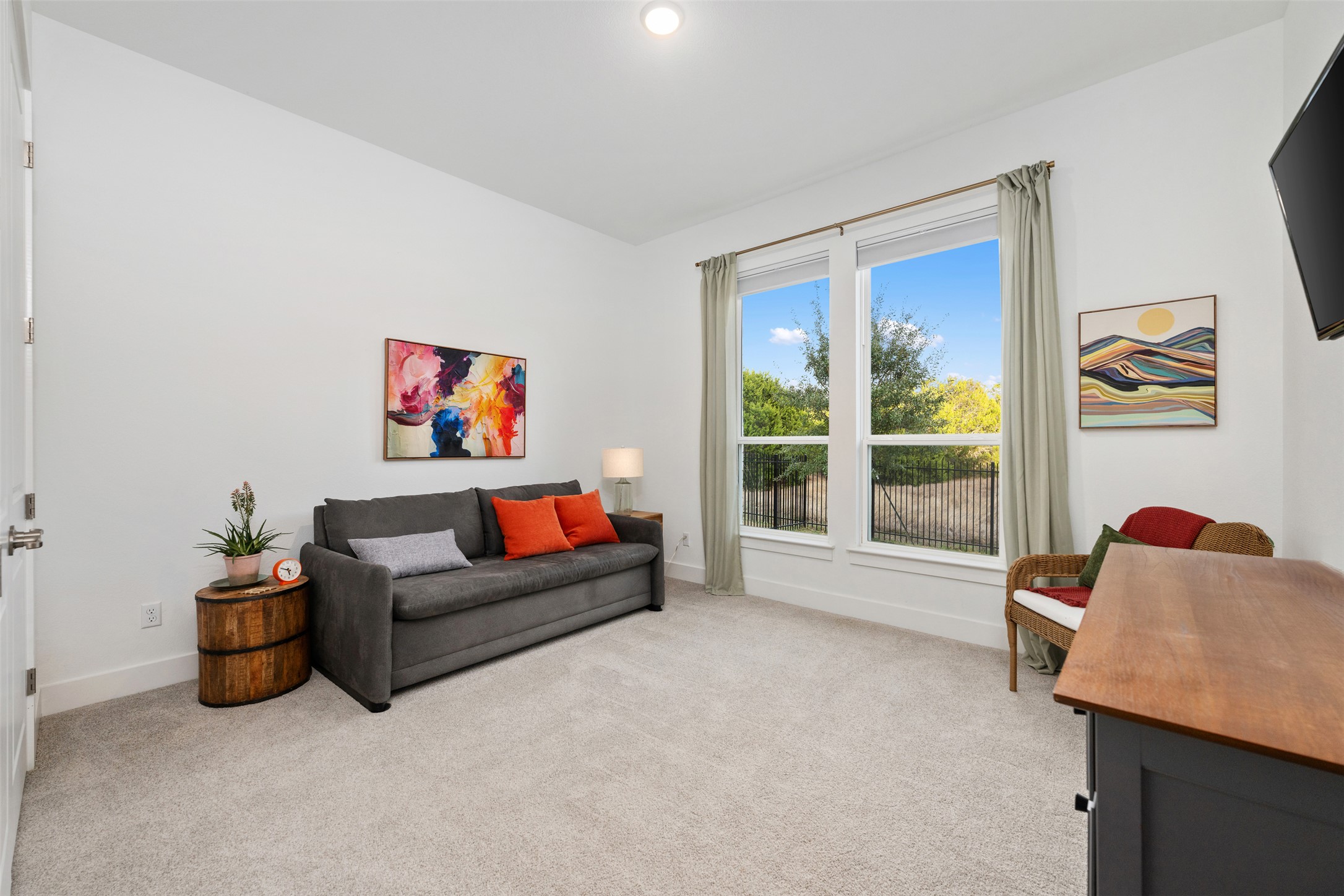 438 Pear Tree Lane Austin, TX 78737 - Photo 21 of 40 a living room with furniture and a window