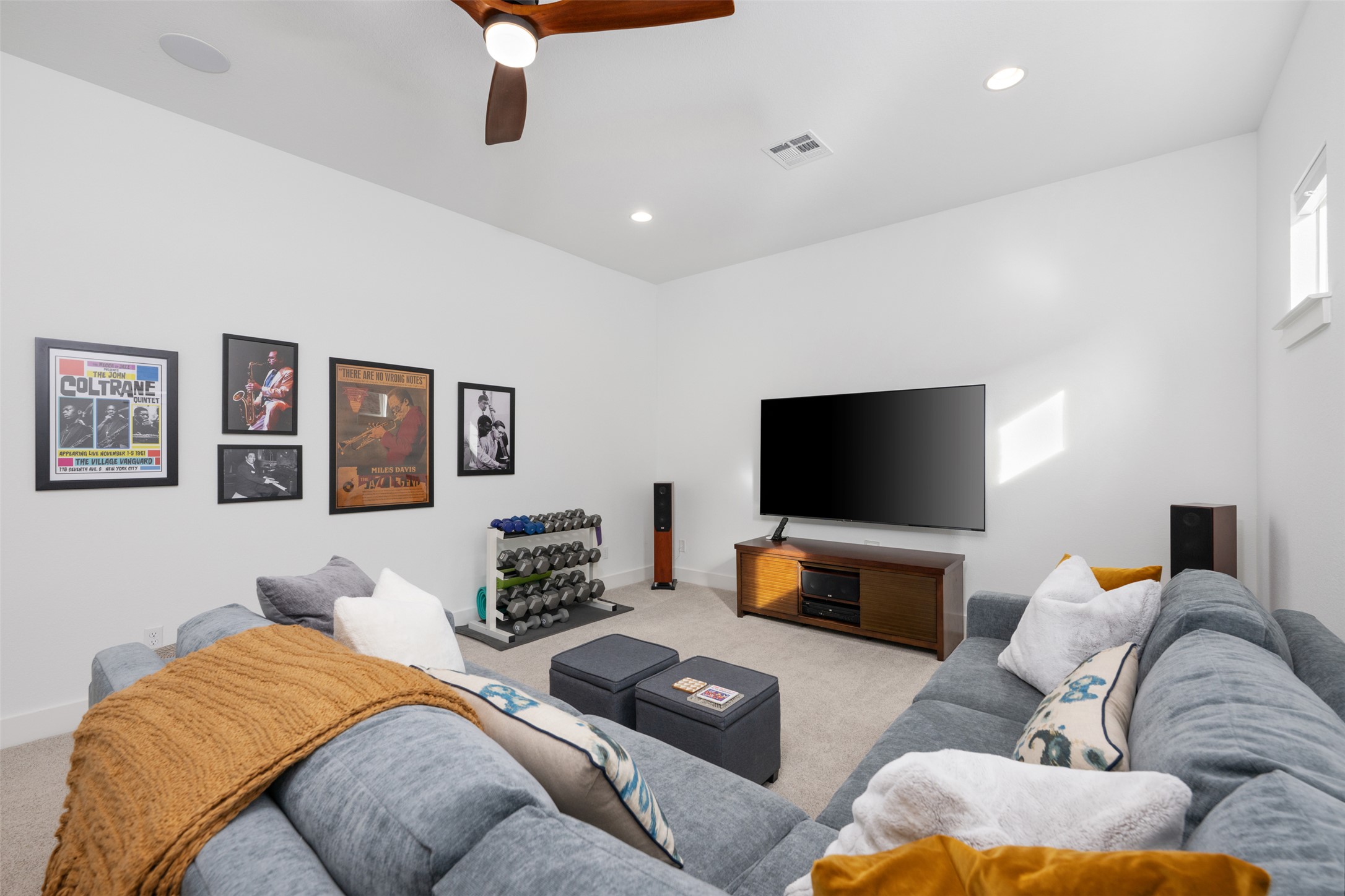 438 Pear Tree Lane Austin, TX 78737 - Photo 26 of 40 a living room with furniture and a flat screen tv