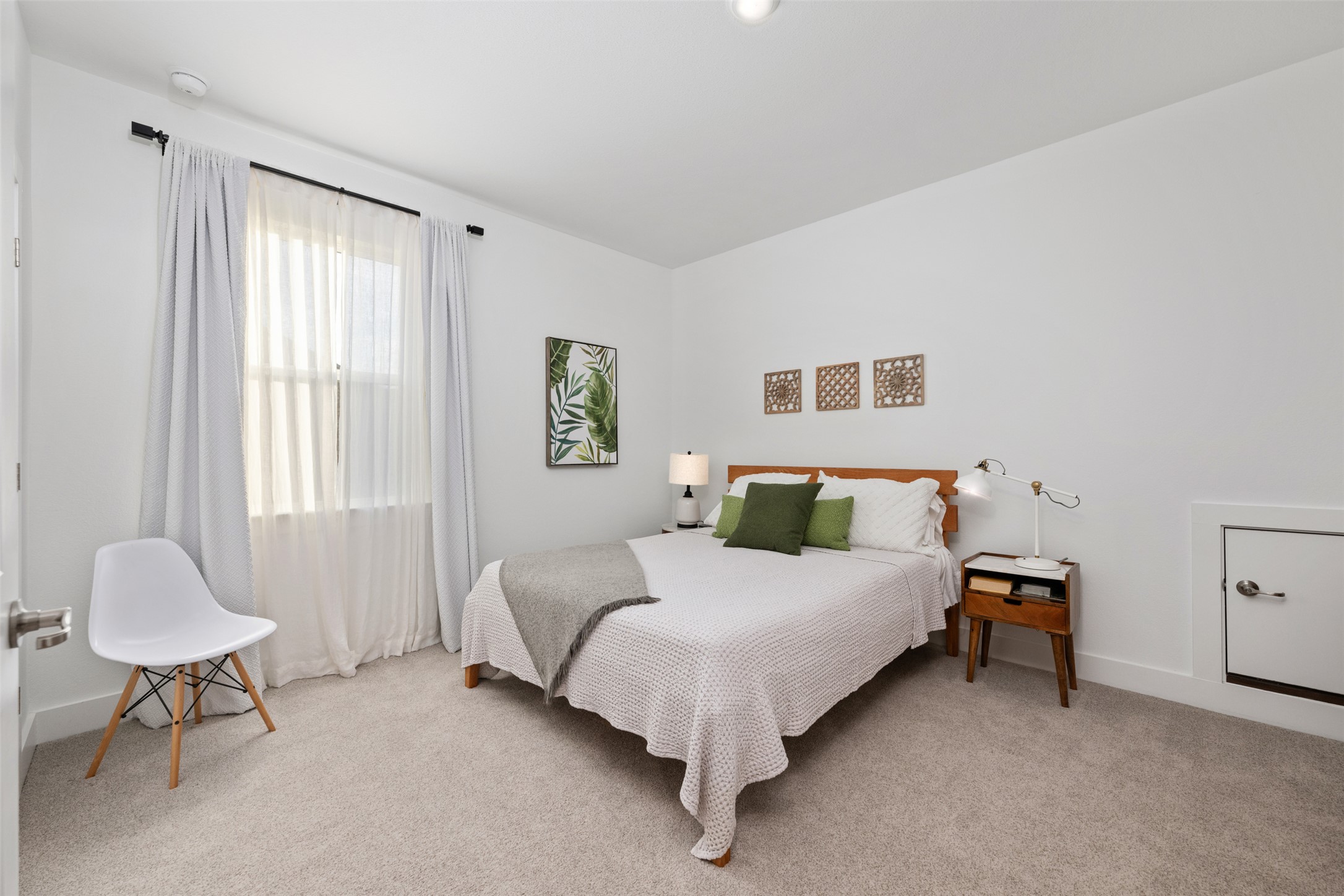438 Pear Tree Lane Austin, TX 78737 - Photo 31 of 40 a bedroom with a bed and a chandelier