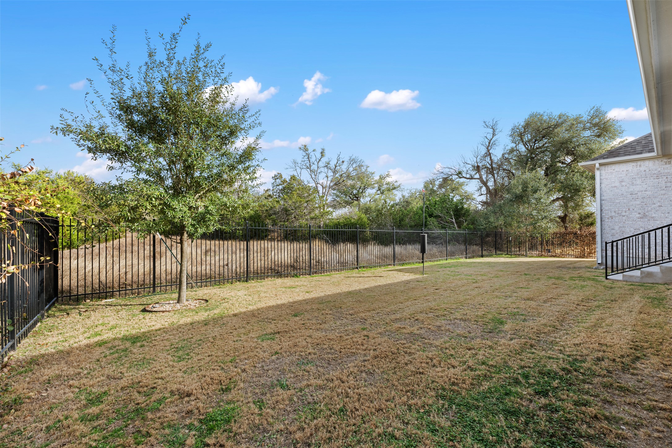 438 Pear Tree Lane Austin, TX 78737 - Photo 34 of 40 View of fenced backyard