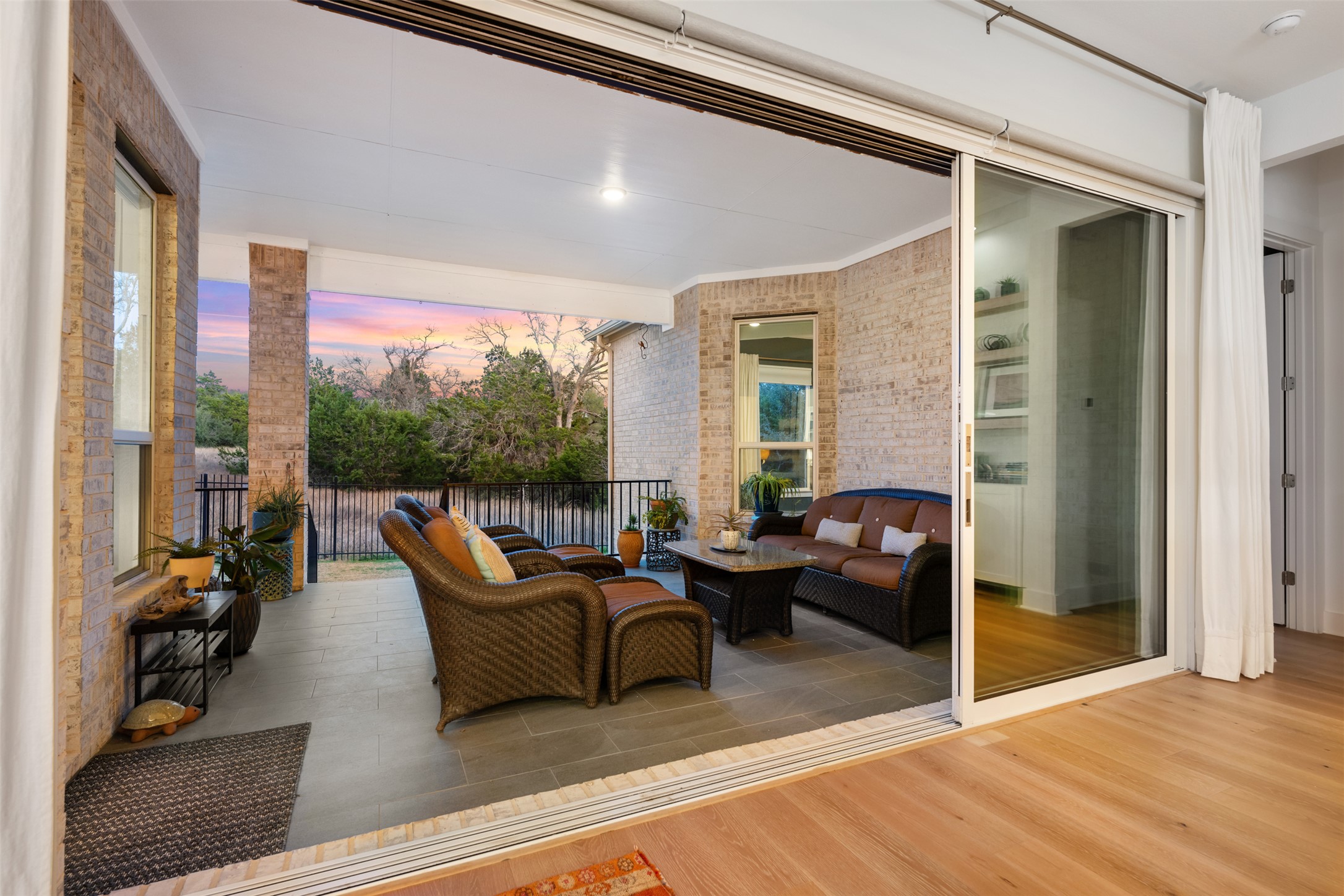 438 Pear Tree Lane Austin, TX 78737 - Photo 35 of 40 a living room with furniture and a large window