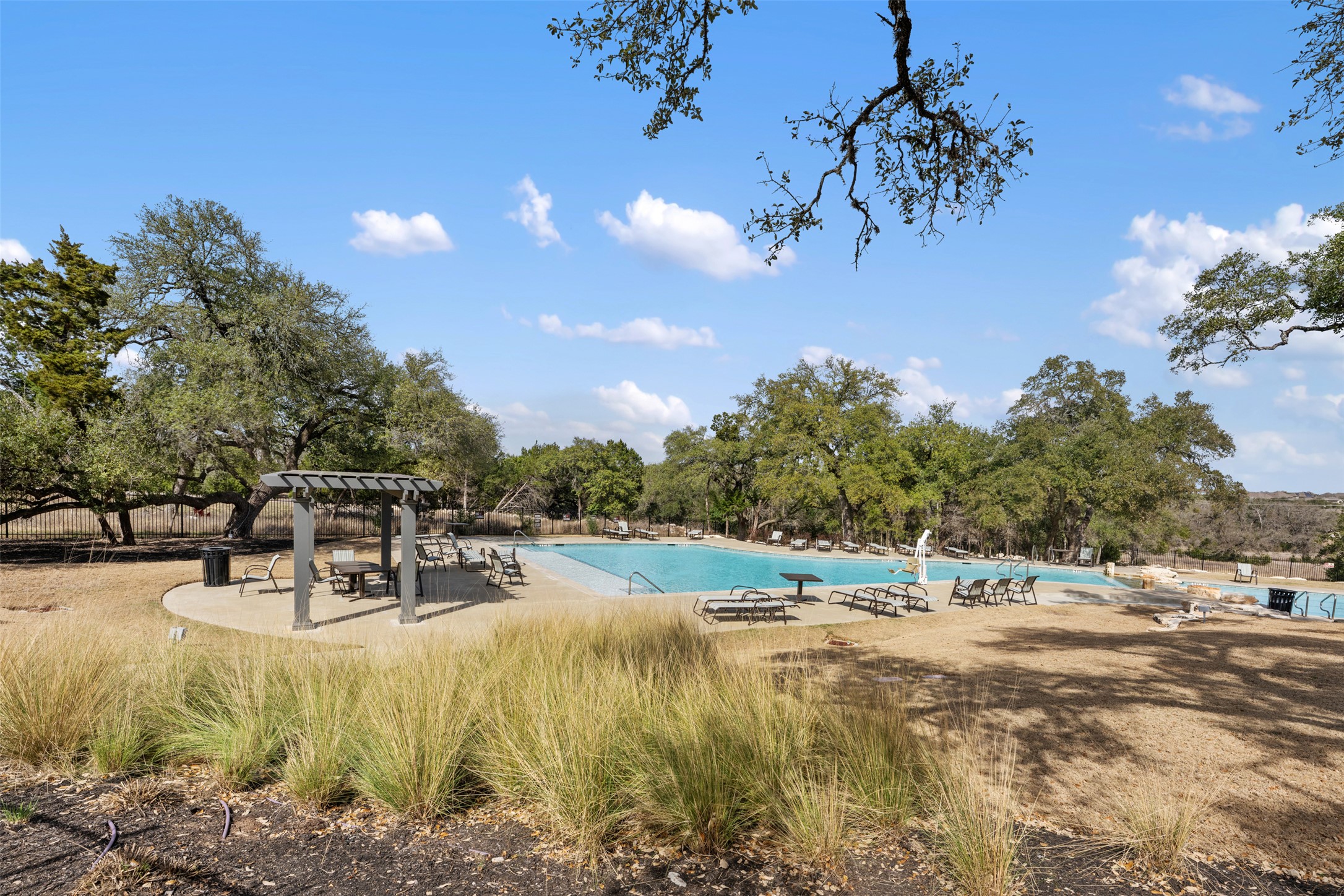 438 Pear Tree Lane Austin, TX 78737 - Photo 39 of 40 a view of a playground with a yard and lake view