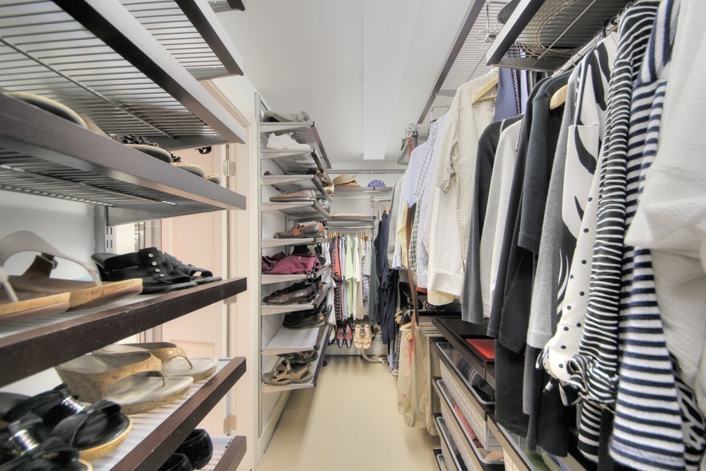 158 Evans Rd Extension Marblehead, MA 01945 - Photo 25 of 30 a view of walk in closet with clothes and shoes