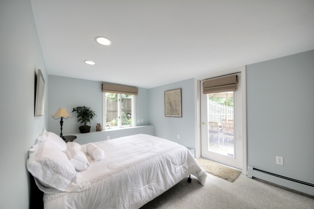 158 Evans Rd Extension Marblehead, MA 01945 - Photo 28 of 30 a bed sitting in a spacious bedroom next to a window and dresser