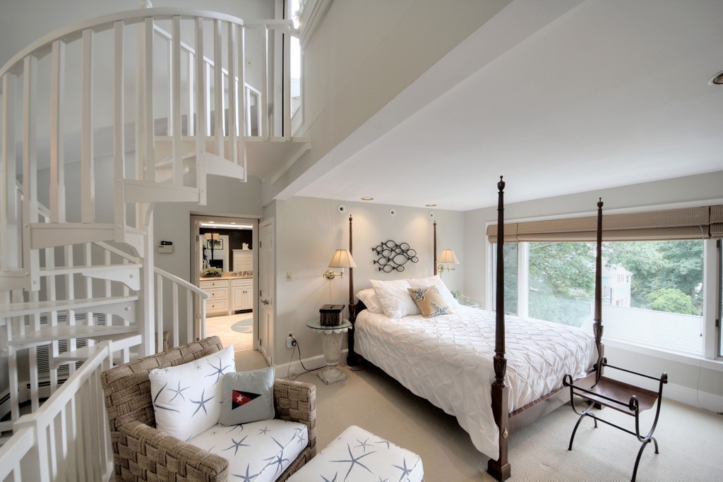 158 Evans Rd Extension Marblehead, MA 01945 - Photo 3 of 30 a bedroom with a bed and glass window