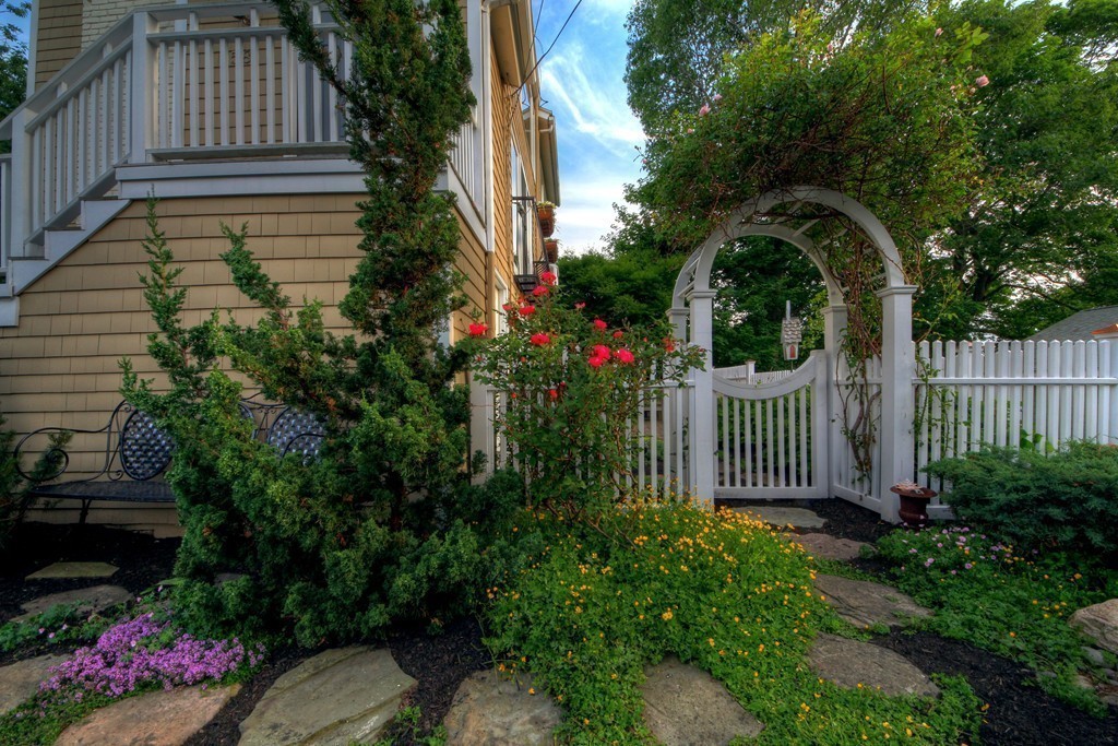 158 Evans Rd Extension Marblehead, MA 01945 - Photo 8 of 30 a view of a house with a flower garden