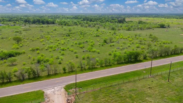 a view of a field with a yard