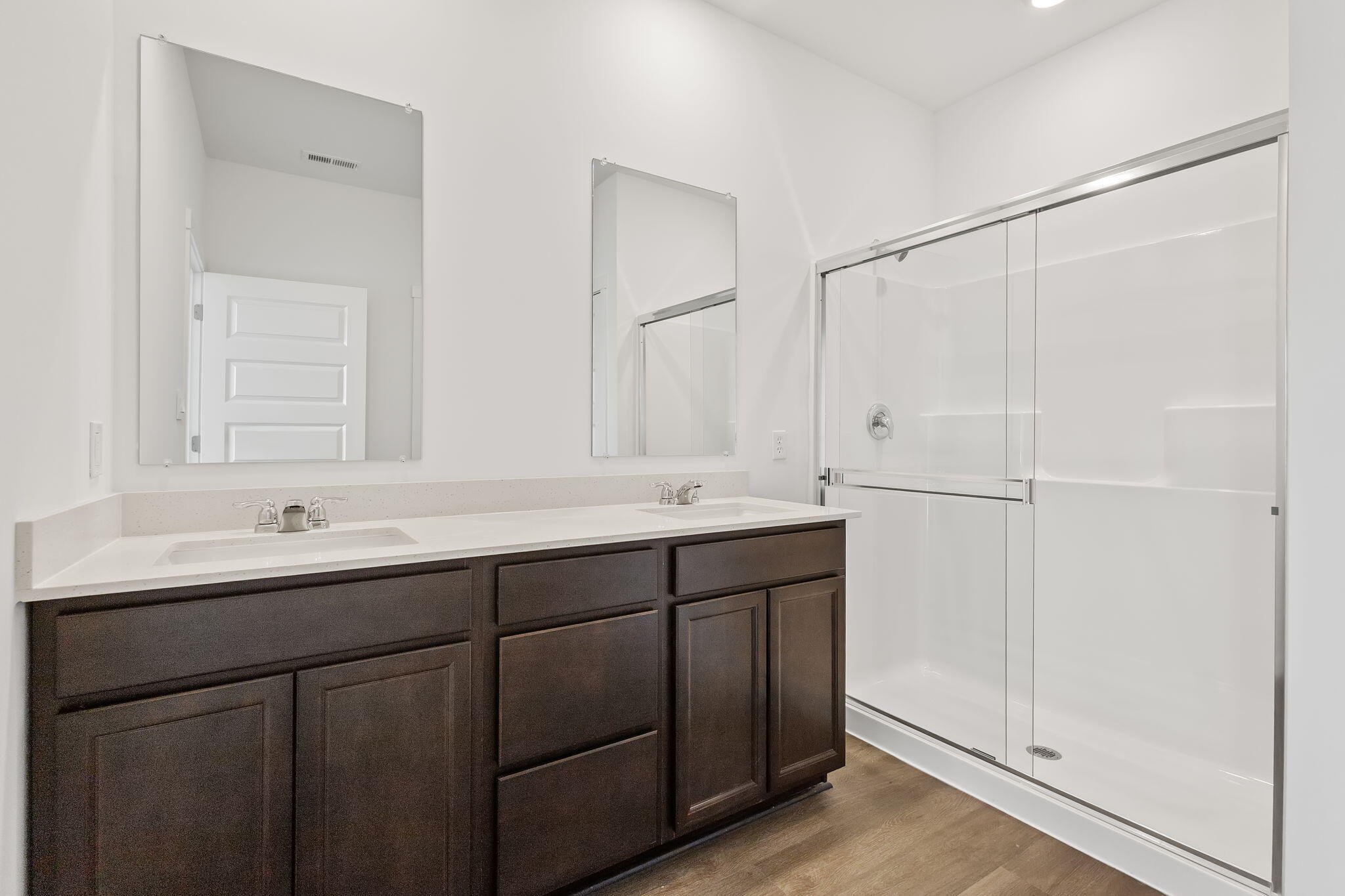 10524 Morse Place Crown Point, IN 46307 - Photo 15 of 21 a bathroom with a double vanity sink and mirror