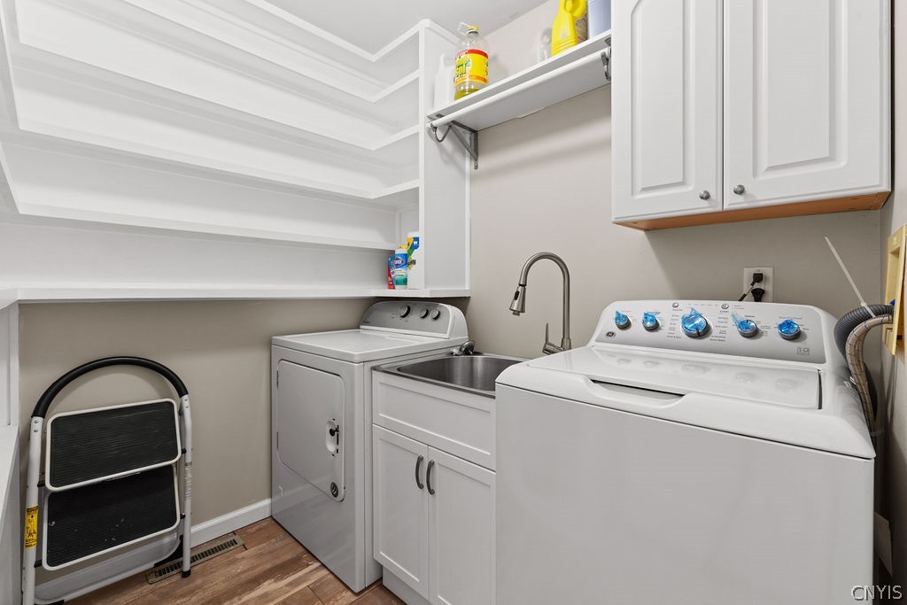 2856 Hiltonwood Road Lysander, NY 13027 - Photo 23 of 50 1st floor laundry room next to the kitchen with ad