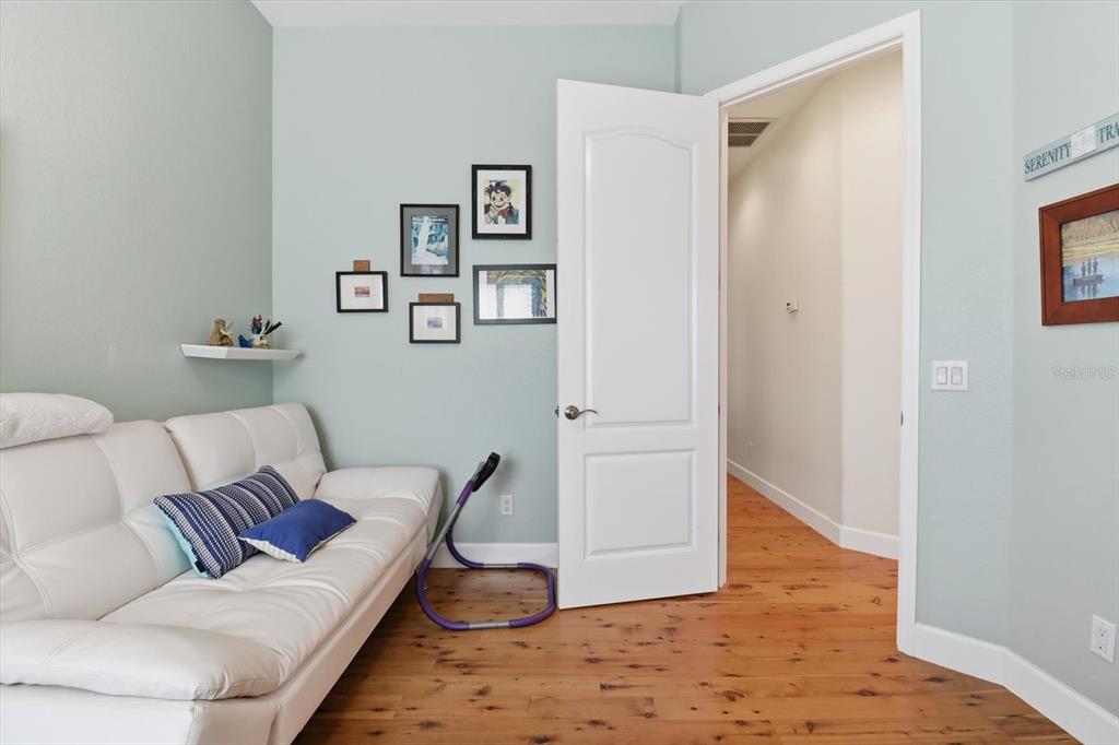 5 Palm Drive Yankeetown, FL 34498 - Photo 22 of 53 a living room with furniture and a wooden floor