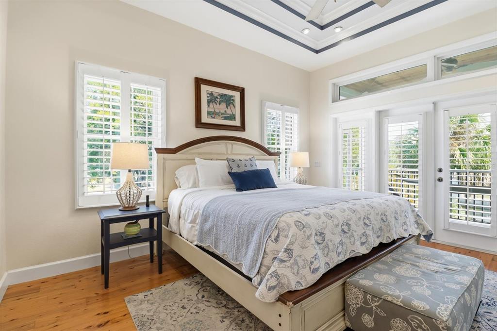 5 Palm Drive Yankeetown, FL 34498 - Photo 24 of 53 a bedroom with a bed table and window