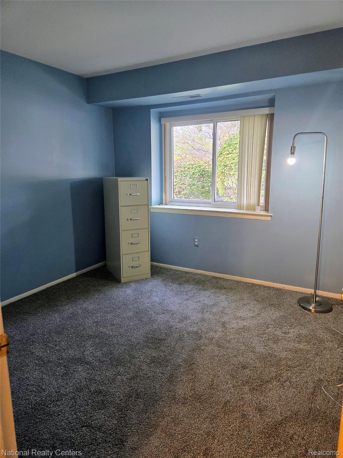 27354 Evergreen Road Southfield, MI 48076 - Photo 11 of 13 Secondary bedroom featuring carpet floors and baseboards