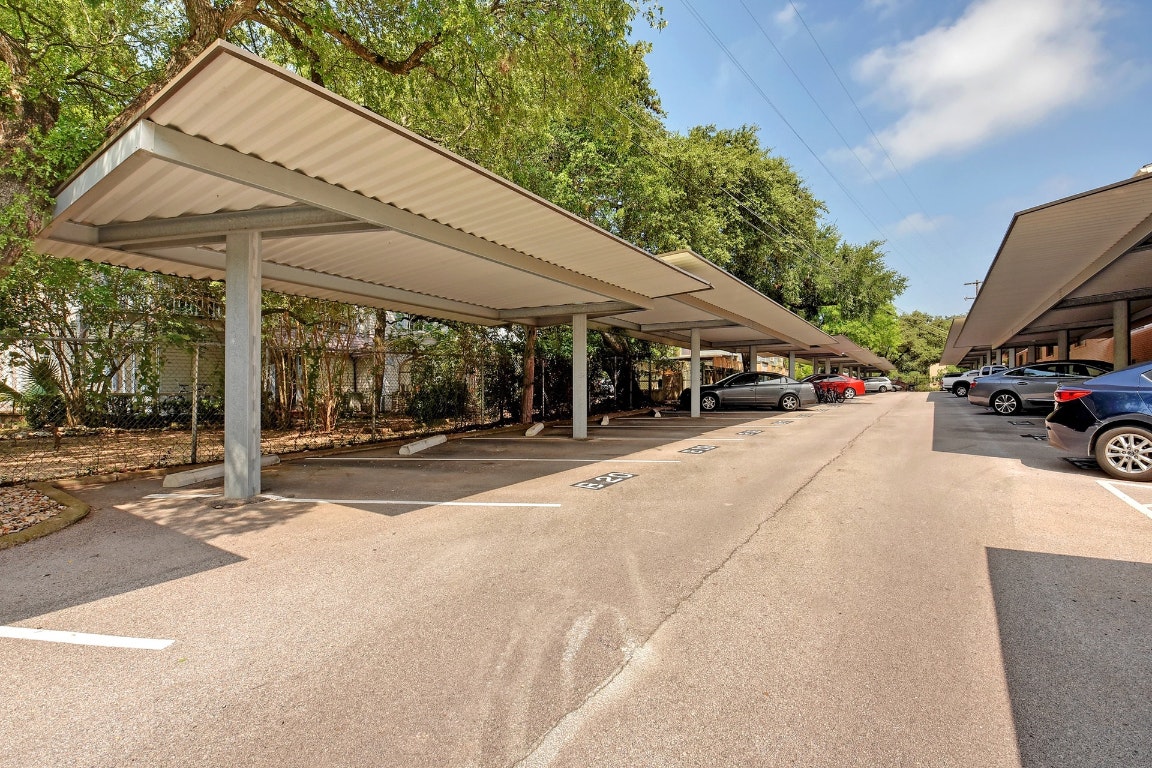 1210 Windsor Road, Unit 117 Austin, TX 78703 - Photo 12 of 17 a view of street with parked cars