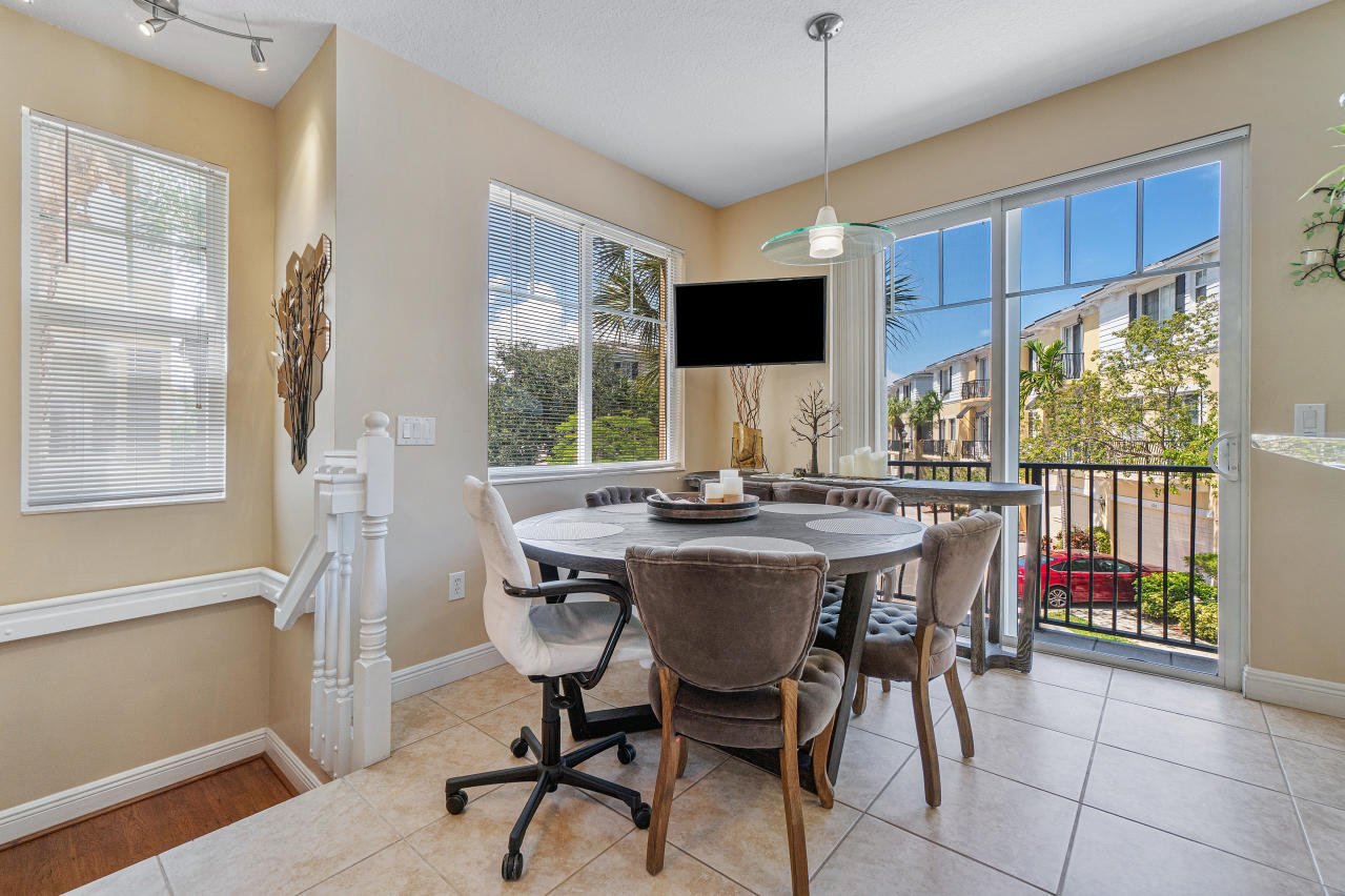 669 Northwest 38th Circle Boca Raton, FL 33431 - Photo 12 of 35 a view of a dining room with furniture window and outside view