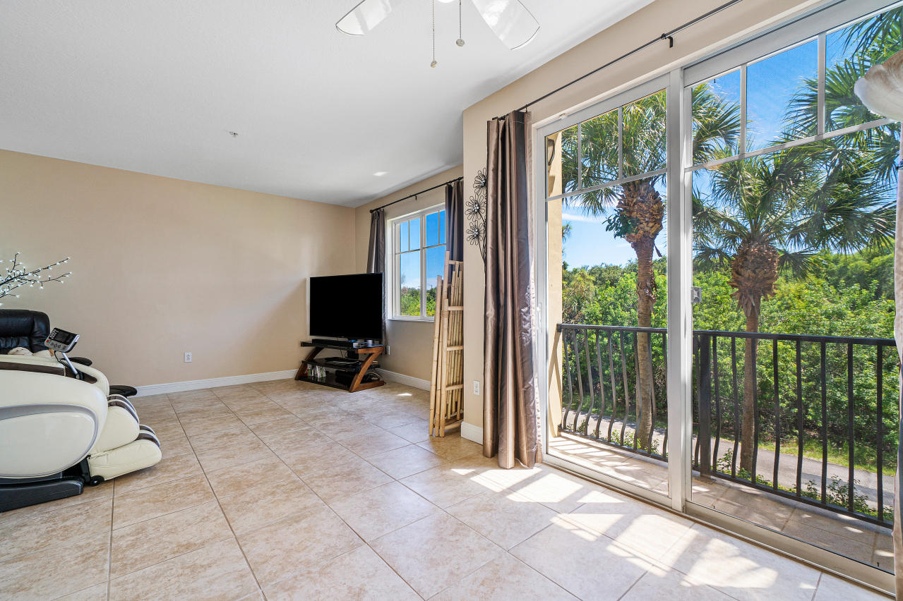 669 Northwest 38th Circle Boca Raton, FL 33431 - Photo 17 of 35 a view of a livingroom with workspace and a window