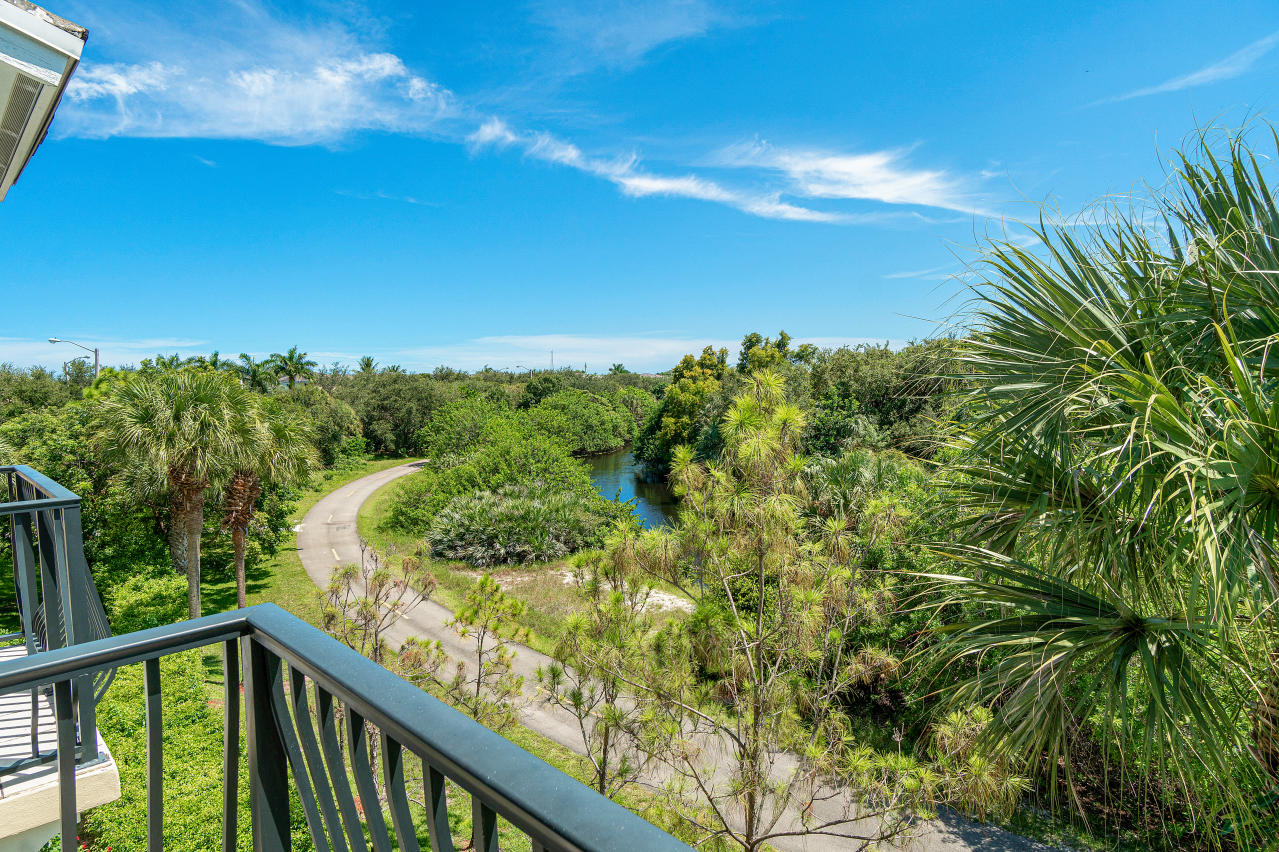 669 Northwest 38th Circle Boca Raton, FL 33431 - Photo 29 of 35 a view of a lake from a balcony