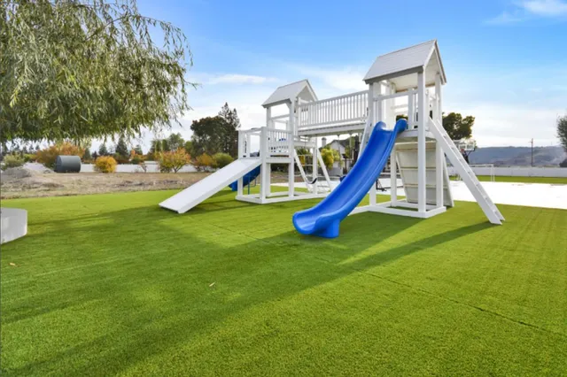 a view of a house with a big yard