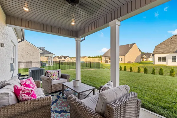 a outdoor living space with furniture and garden