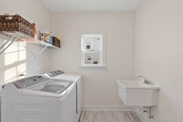 a utility room with dryer and washer