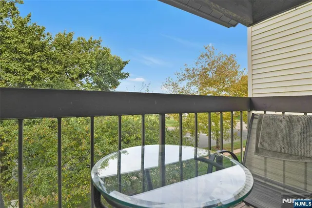 a view of roof deck with furniture
