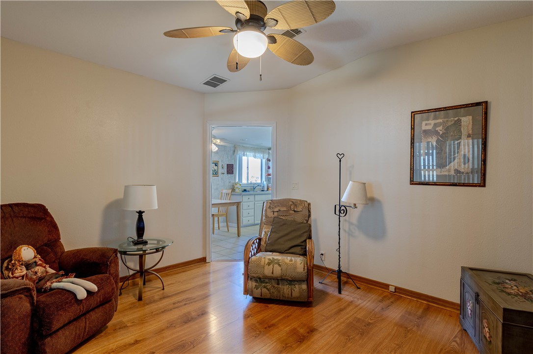 327 Papaya Circle Sebastian, FL 32976 - Photo 11 of 32 a living room with furniture and a window