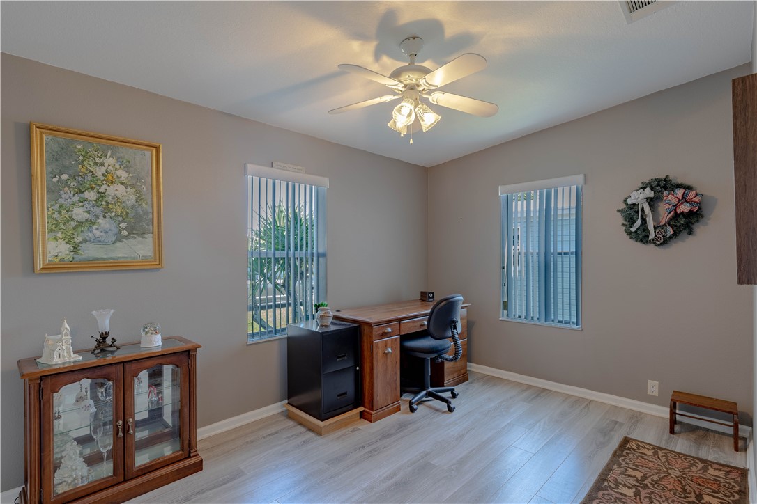 327 Papaya Circle Sebastian, FL 32976 - Photo 17 of 32 a view of a workspace with furniture and a window
