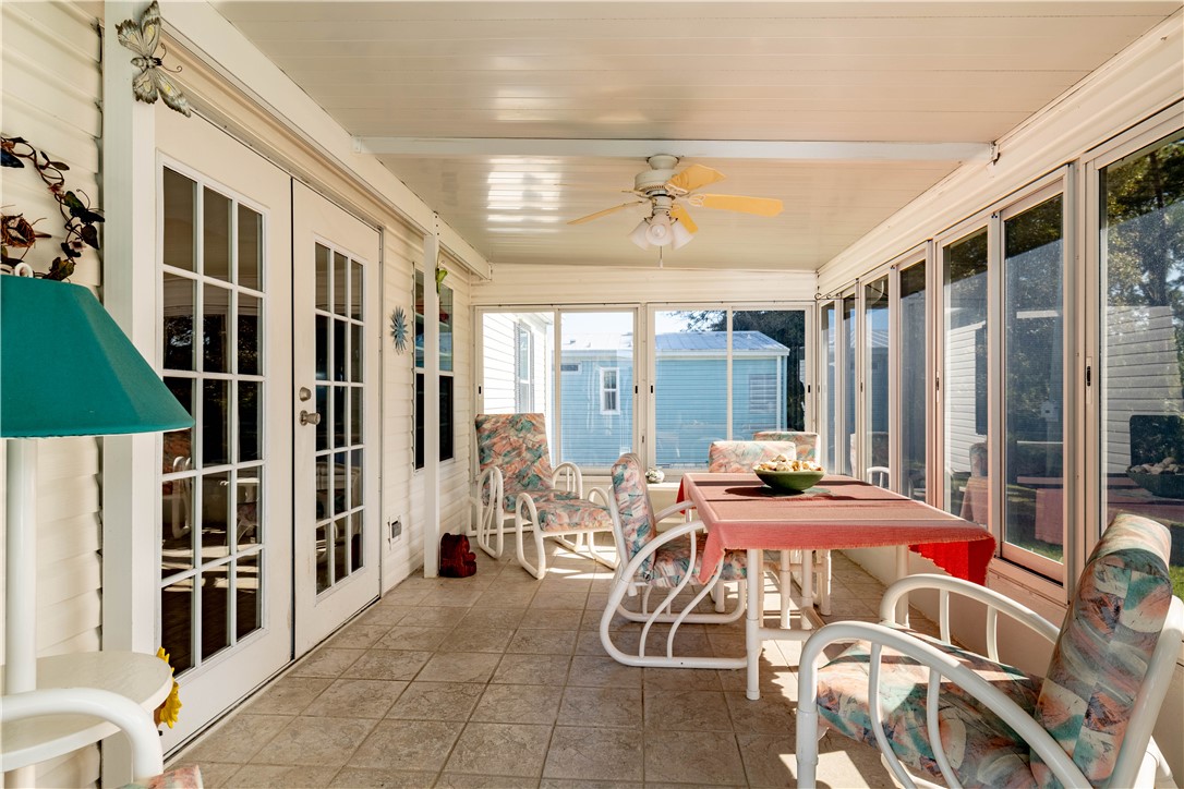 327 Papaya Circle Sebastian, FL 32976 - Photo 2 of 32 a patio with table and chairs