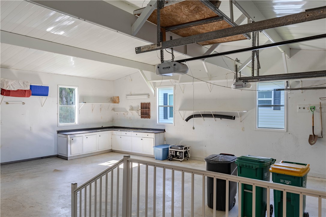 327 Papaya Circle Sebastian, FL 32976 - Photo 23 of 32 a kitchen with stainless steel appliances granite countertop a dishwasher and cabinets with wooden floor