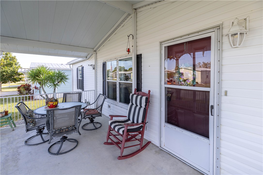 327 Papaya Circle Sebastian, FL 32976 - Photo 3 of 32 a outdoor space with furniture