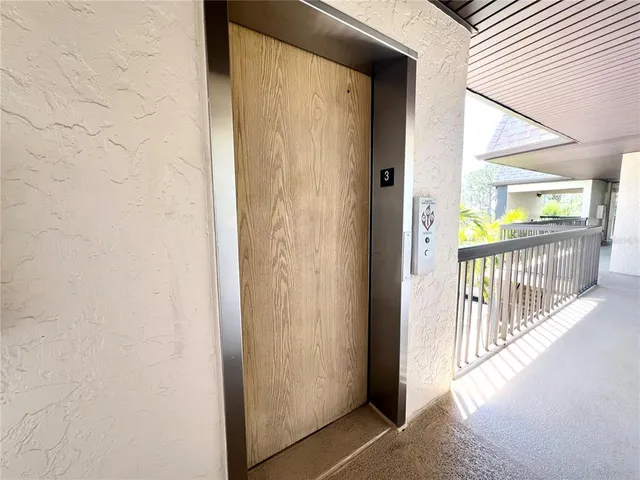 a swimming pool with outdoor seating and yard