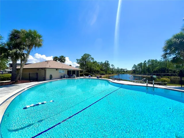 a view of a building with a big yard