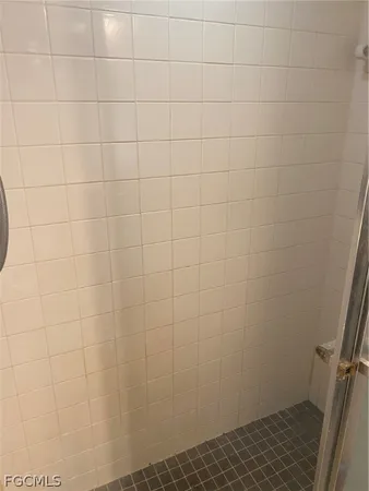 a bathroom with a white toilet