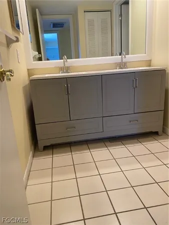 a bathroom with a mirror