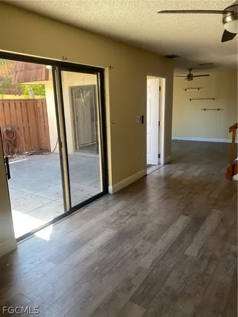 a view of entryway with wooden floor