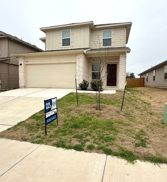 19101 Romano Drive Elgin, TX 78621 - Photo 2 of 36 a backyard of a house with table and chairs