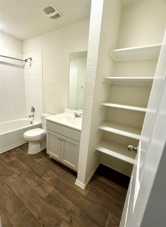 19101 Romano Drive Elgin, TX 78621 - Photo 33 of 36 a bathroom with a sink a toilet and a bathtub