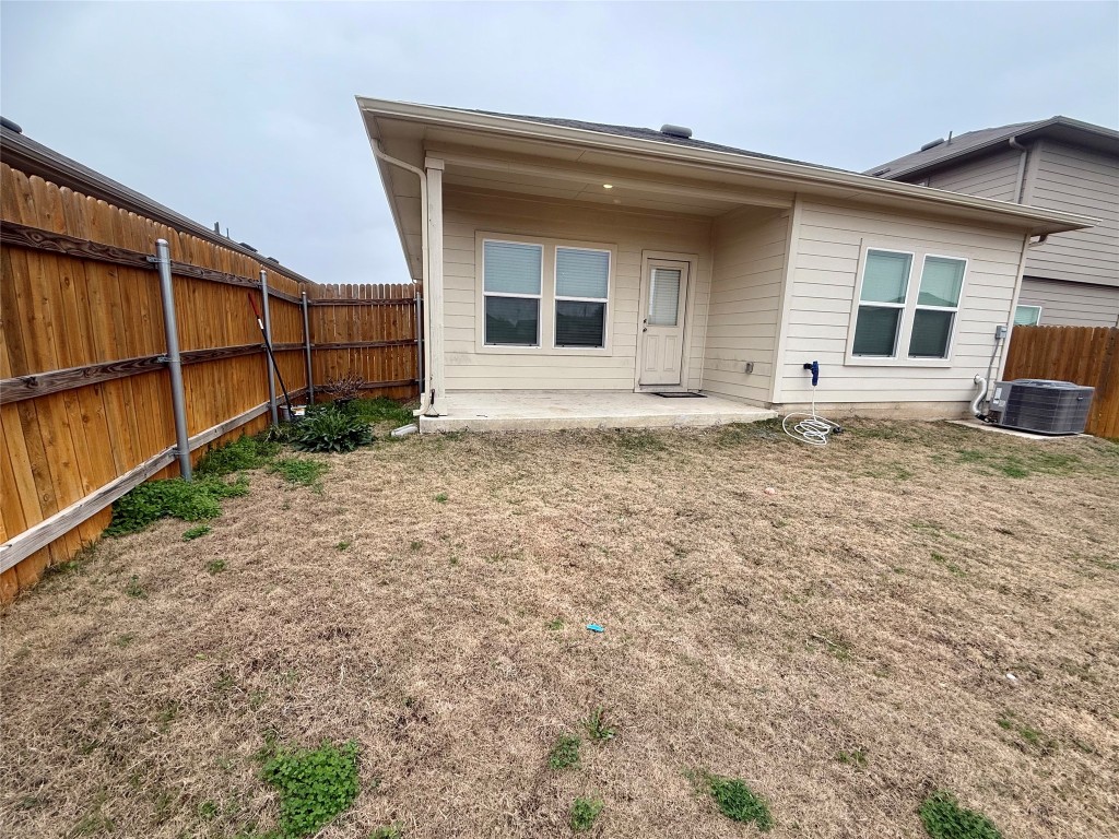 19101 Romano Drive Elgin, TX 78621 - Photo 35 of 36 a house with a outdoor space