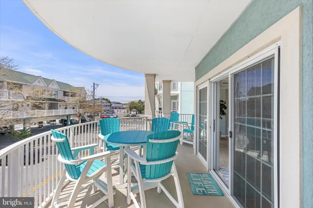 a painting on a wall next to a wall with a picture on the wall