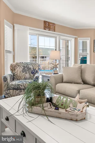 a view of a chair and table in the balcony