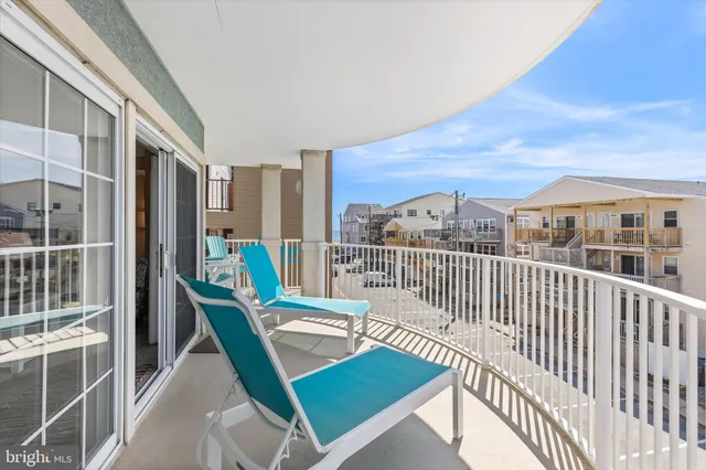 a view of a balcony with staircase