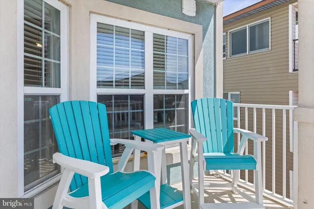 a bathroom with a tub a sink and a shower