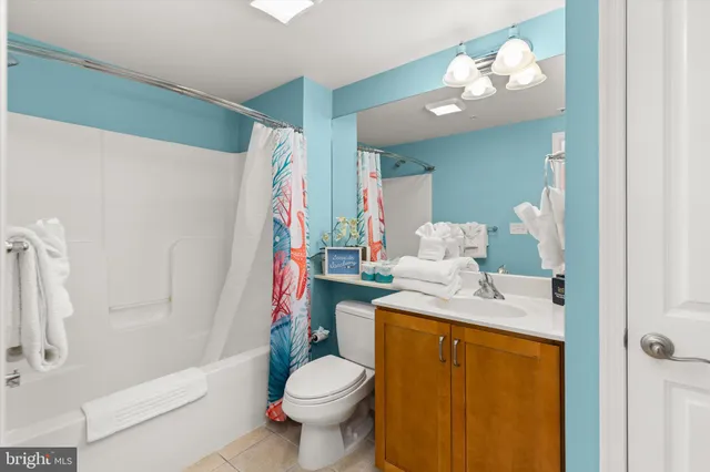 a bedroom with furniture and a book shelf