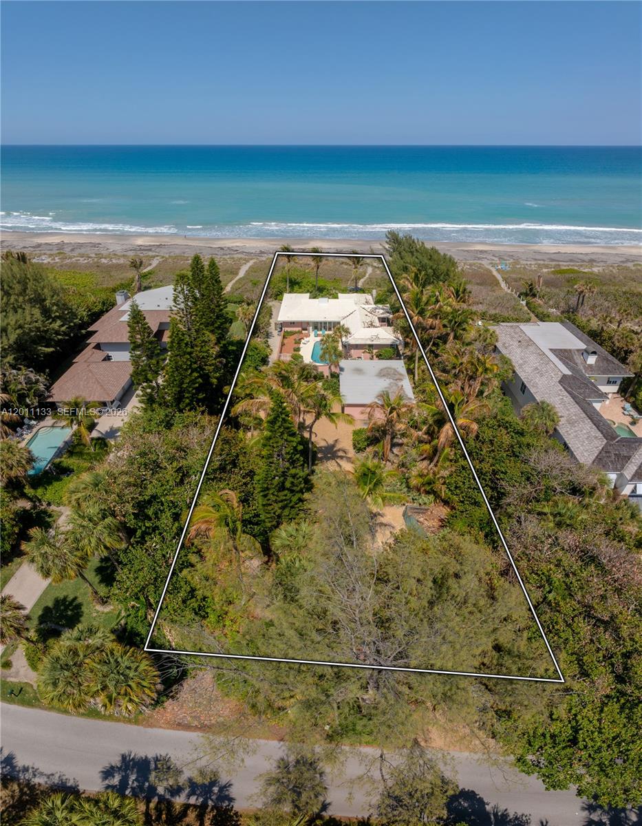 55 North Beach Road Jupiter Island, FL 33455 - Photo 3 of 56 a view of an ocean and beach