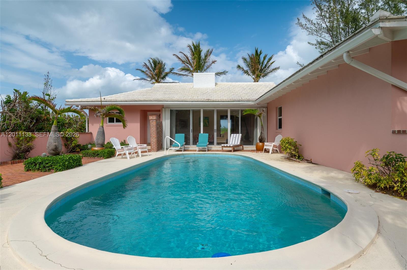 55 North Beach Road Jupiter Island, FL 33455 - Photo 35 of 56 a view of a house with swimming pool