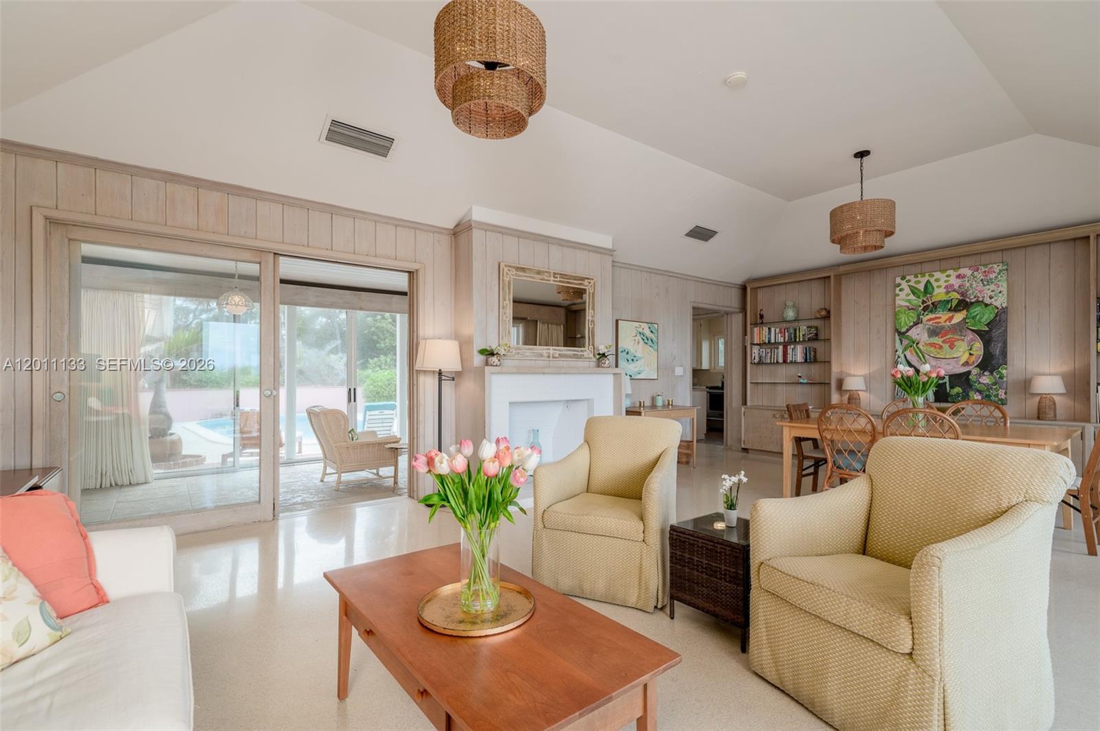 55 North Beach Road Jupiter Island, FL 33455 - Photo 38 of 56 a living room with furniture potted plant and a large window