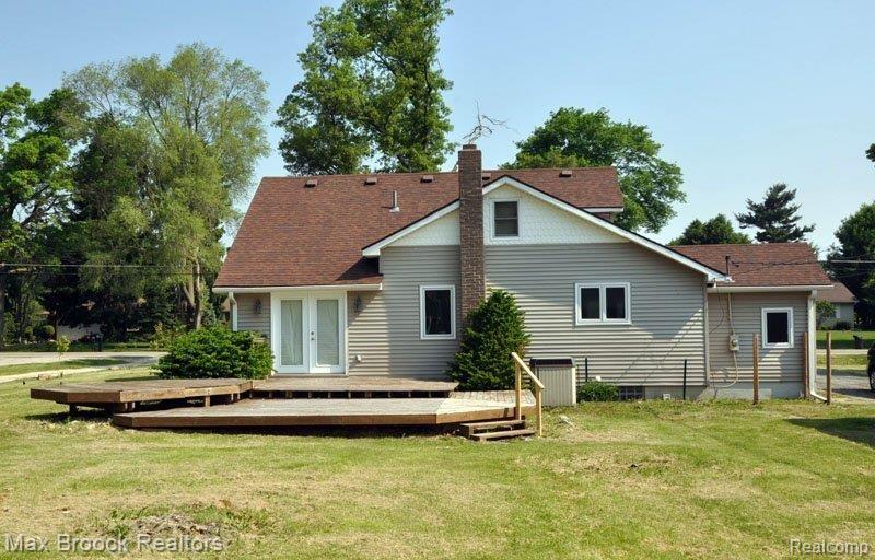 1115 West Livingston Road Highland, MI 48357 - Photo 2 of 8 Back of house