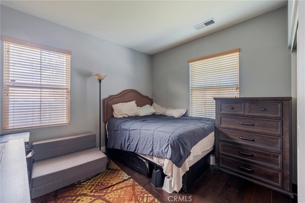 17073 Spring Canyon Place Riverside, CA 92503 - Photo 22 of 43 a bedroom with a bed and a window