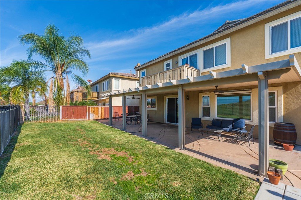 17073 Spring Canyon Place Riverside, CA 92503 - Photo 28 of 43 a view of a house with a patio